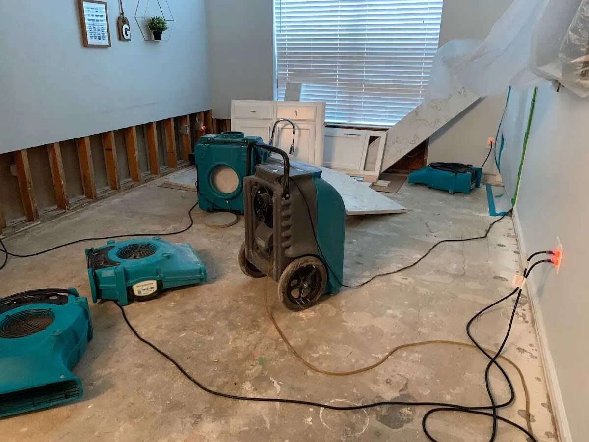 Dehumidifier in flood-cut room for Water Damage Restoration in Corsicana